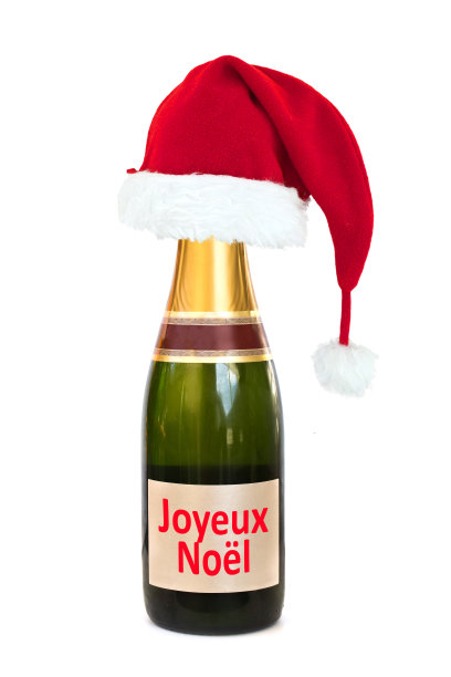 香槟酒瓶上的圣诞帽图片下载