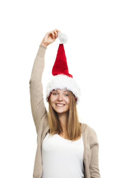小女孩戴着圣诞老人的帽子图片下载