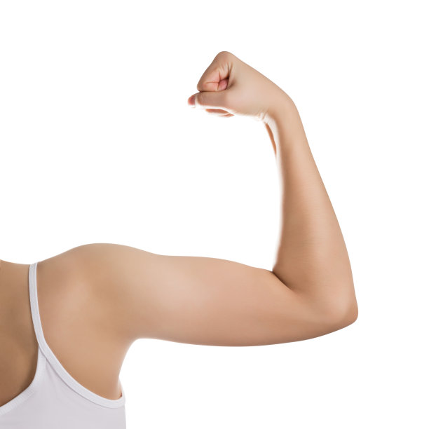 女人显示她的二头肌孤立在白色。图片下载