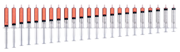 红色药物注射器。图片下载