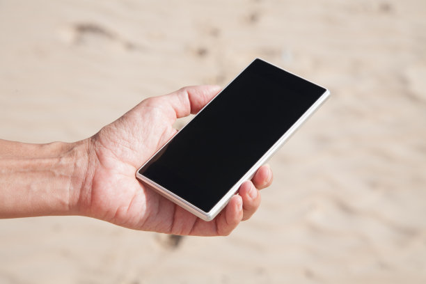 手握智能手机，手握沙子图片下载