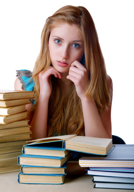 拿着一堆书和书的女孩图片下载