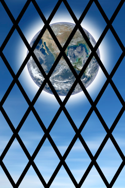 透过监狱铁栏看到的世界的概念性图像图片下载