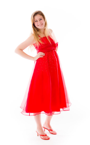 模特孤立在朴素的背景骄傲自信的手在臀部图片下载