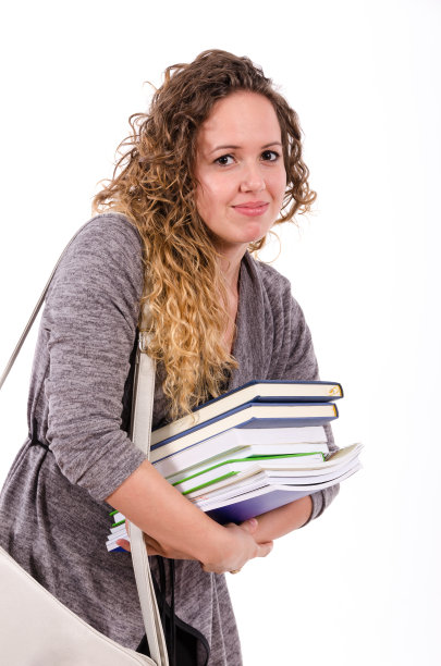拿着书的焦虑的学生女孩图片下载