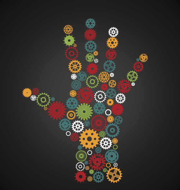 由多色齿轮组成的手在黑色背景上图片下载