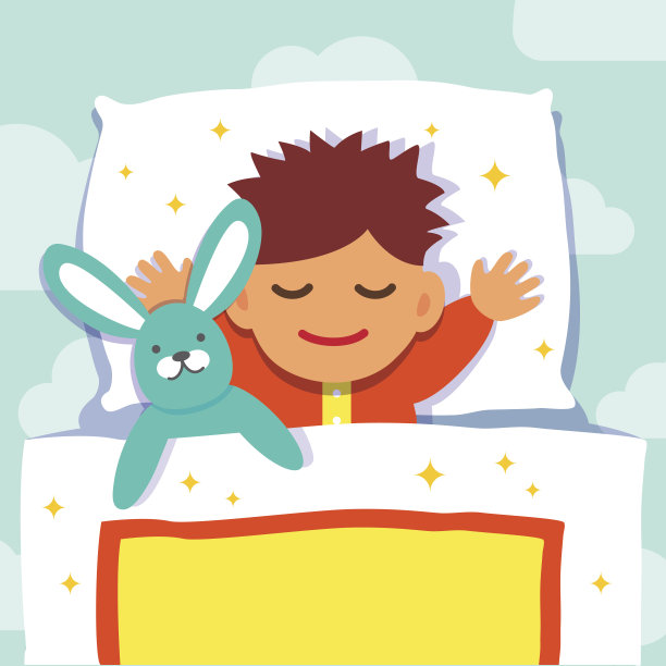 小男孩和他的兔子玩具一起睡觉图片下载