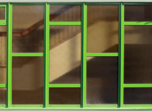 楼梯的一部分通过绿色框架的磨砂玻璃可见图片下载