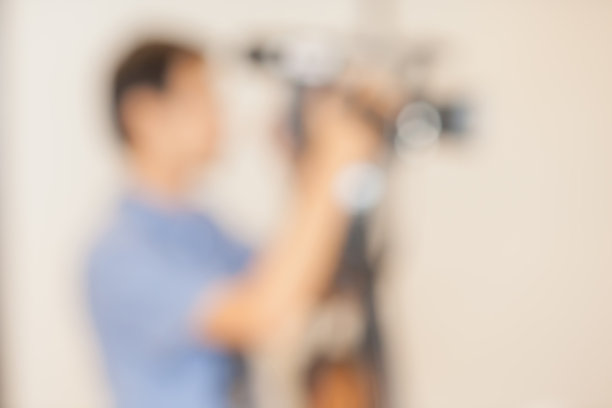 会议活动中值班摄影师的模糊照片。图片下载