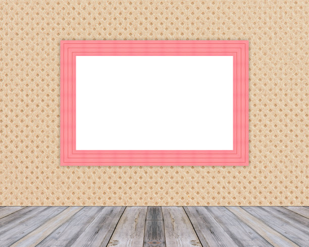 空白的红色木制相框倚在布墙上。图片下载