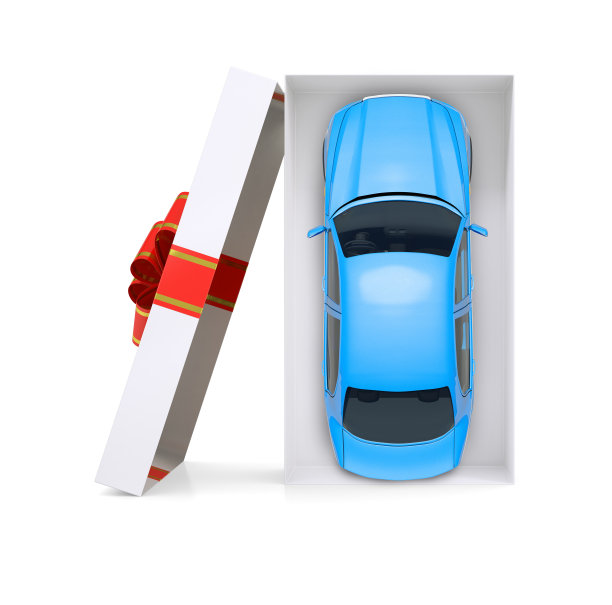 汽车在打开的礼品盒上白色图片下载
