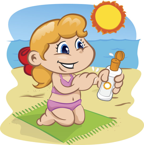 在海滩上擦防晒油的孩子图片下载