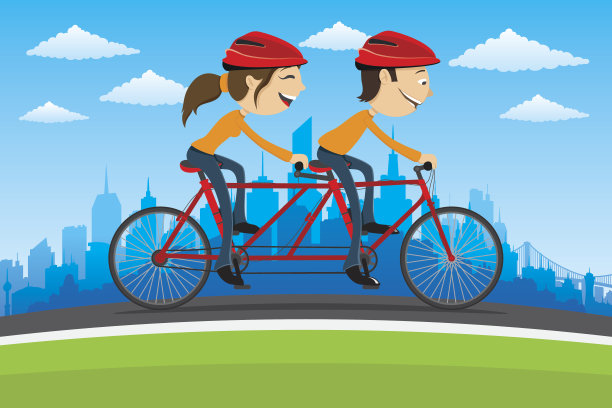 在城市里骑自行车。图片下载