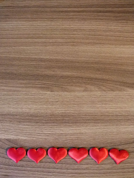 情人节的背景堆着一颗颗小小的心图片下载