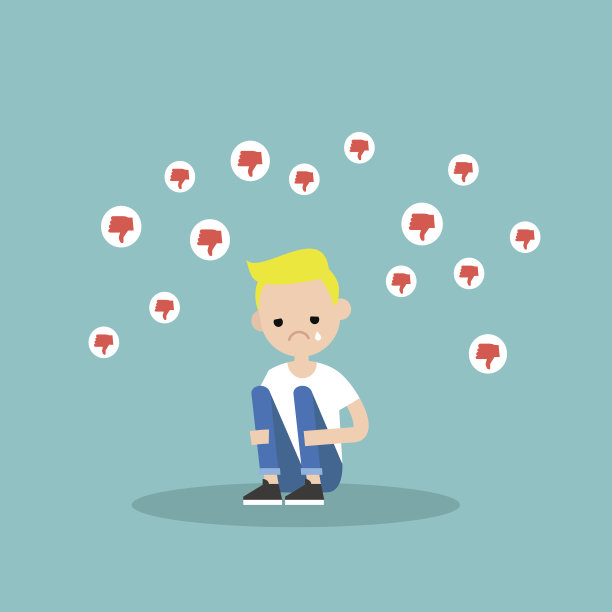 伤心哭泣的男孩坐着抱着他的膝盖图片下载