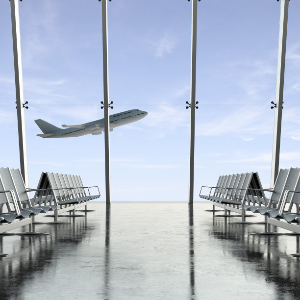 飞机在天空中穿过机场玻璃图片下载