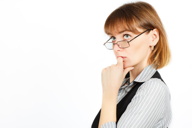 商业的女人。戴眼镜的女孩的肖像。图片下载