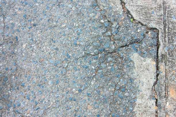 道路背景上的裂缝图片下载