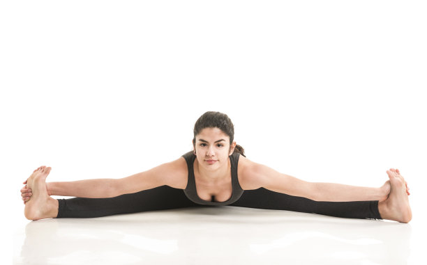 女子展示广角坐姿前屈瑜伽姿势图片下载