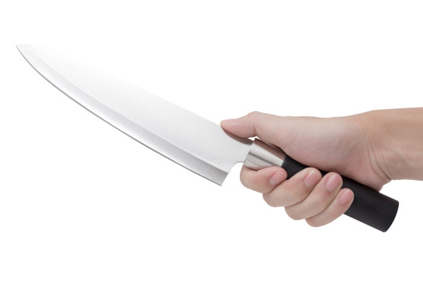 手拿着一把刀孤立在一个白色的背景图片下载