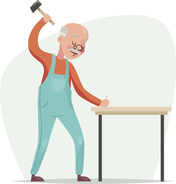 一位老家具制造者用锤子钉在一张复古卡通桌子上图片下载