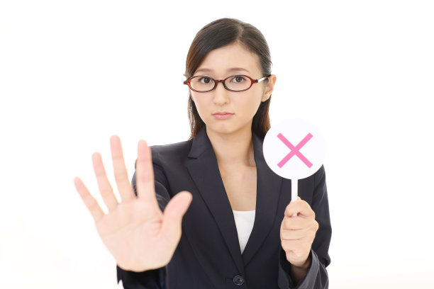 女商人，牌子上写着“没有”图片下载