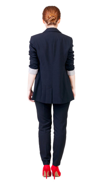 红发女商人沉思的背影。图片下载