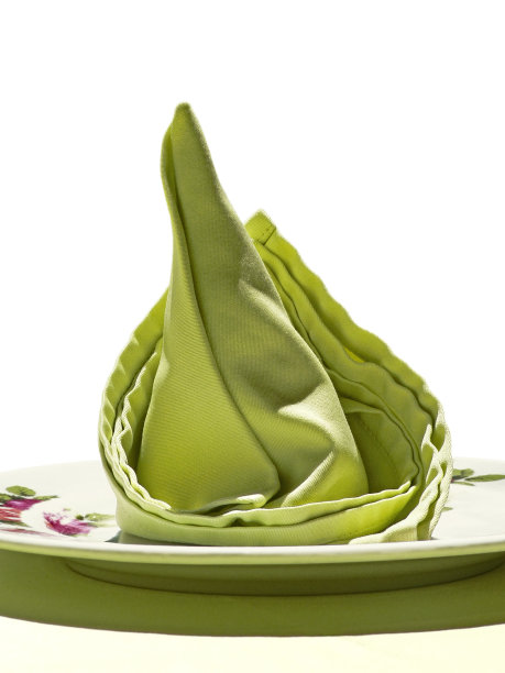 白色背景上的绿色餐巾图片下载