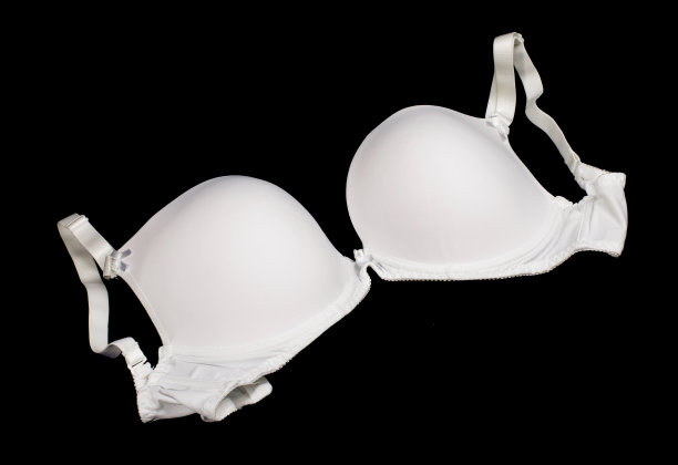 白色正式胸罩孤立在黑色背景图片下载