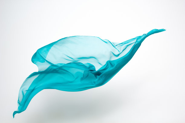 运动中的抽象蓝绿色织物图片下载