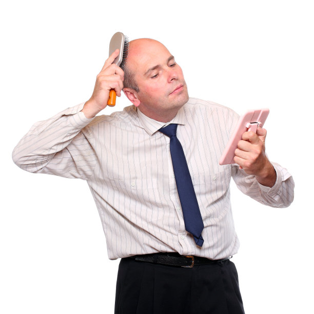 光头商人与镜子。图片下载