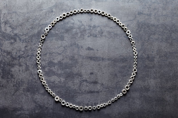 圆圈从坚果的金属纹理背景图片下载