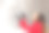 穿红衣服的女人在冬天向空中扔雪素材图片