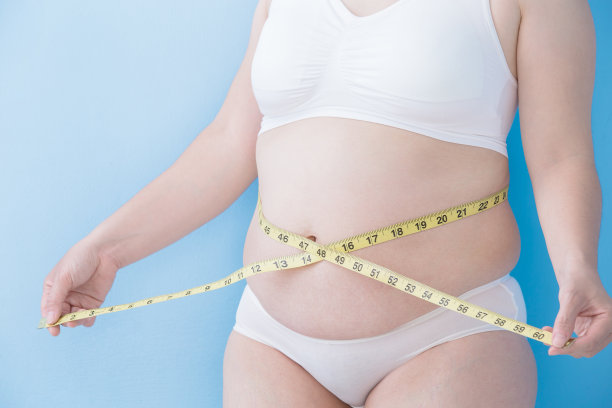 女人取腰尺量图片下载