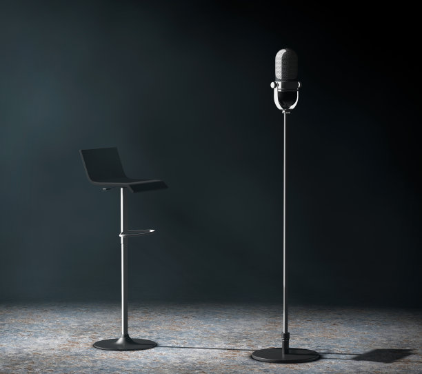 复古银色麦克风与椅子在体积灯。3 d图片下载