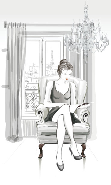 年轻漂亮的女人在看杂志图片下载