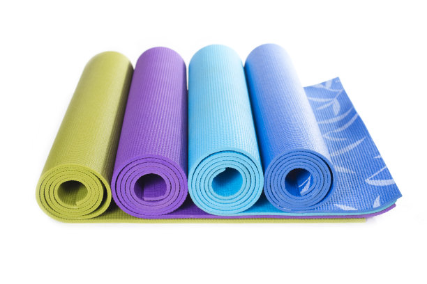 瑜伽垫和白色的背景素材图片