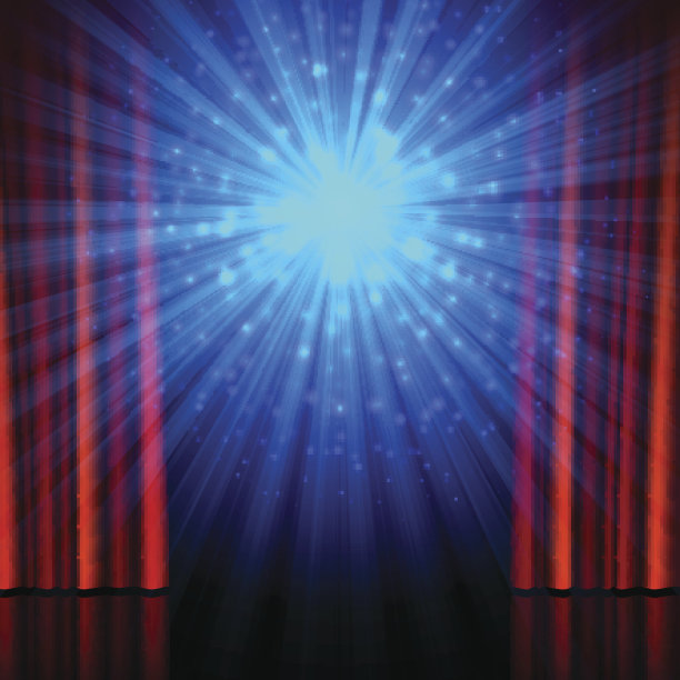 舞台，聚光灯和拉开的红色窗帘素材图片