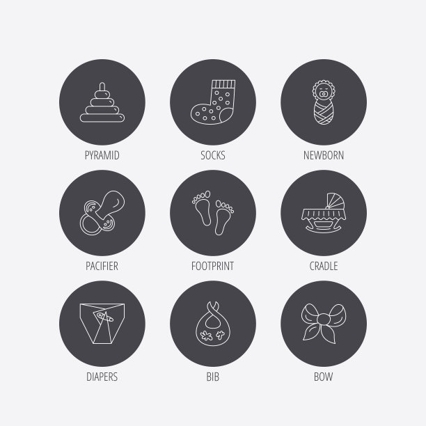 奶嘴、尿布和新生儿偶像。足迹。图片下载
