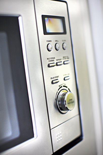 带有按钮和旋钮的现代烤箱控制面板图片下载
