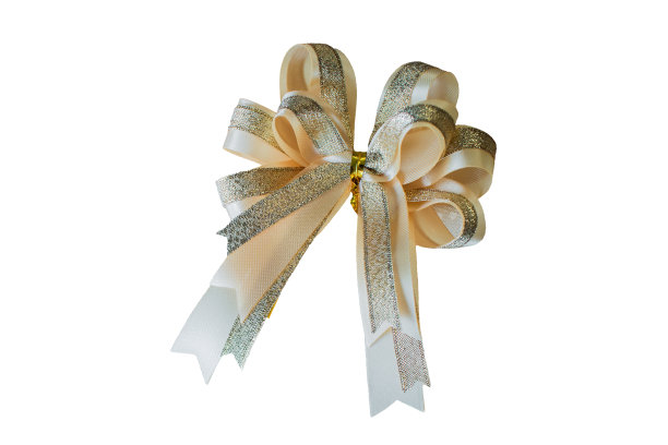 金色丝带弓孤立在白色背景与剪切路径图片下载