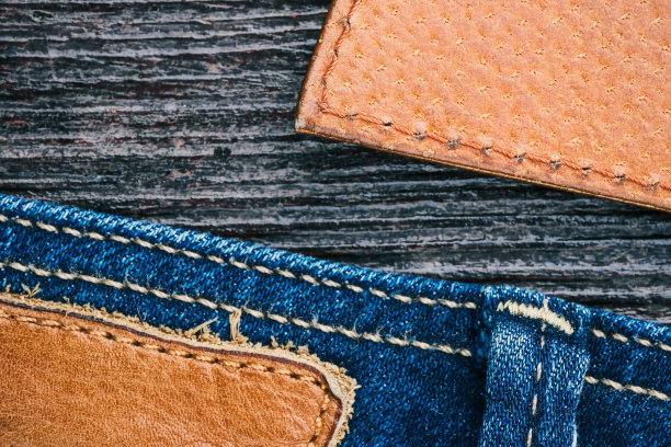 牛仔裤和皮革背景图片下载