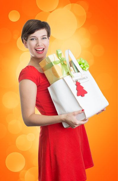 带圣诞礼物的漂亮女人图片下载