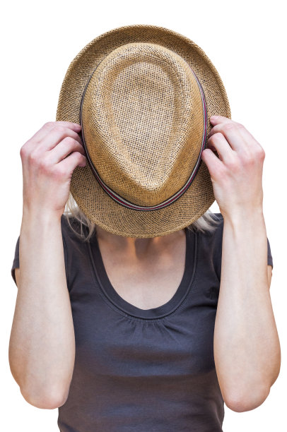 金发女人用夏帽遮住脸图片下载