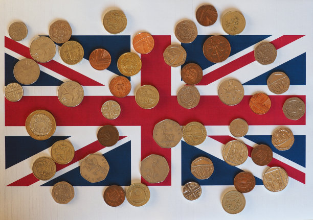 旗帜上的英镑硬币图片下载