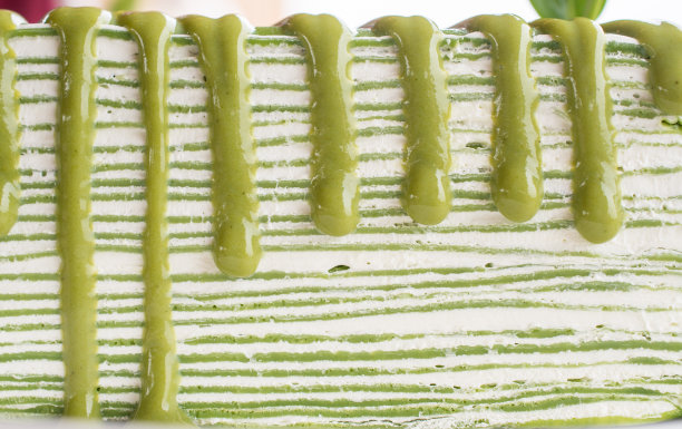 近距离的抹茶绿茶薄饼层。图片下载