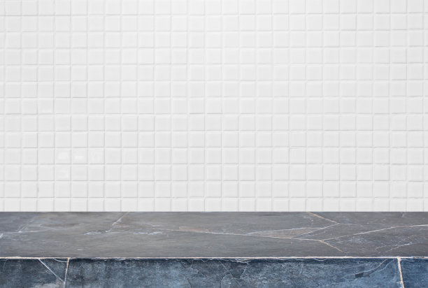 石材台面和白色瓷砖墙的背景素材图片