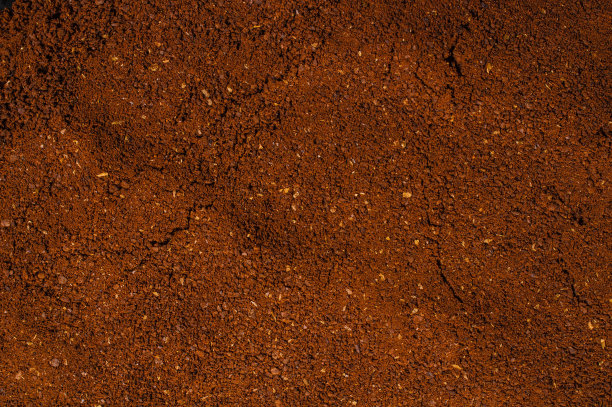 磨碎的咖啡粉背景可可勺素材图片