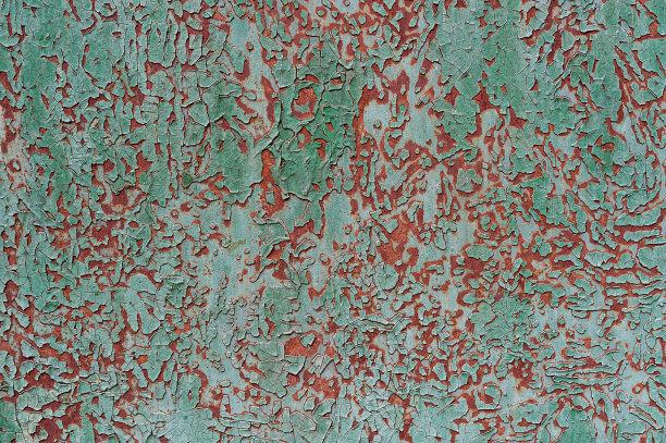 抽象的背景，旧的开裂的灰泥墙，油漆污渍和裂缝。图片下载