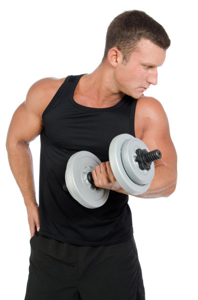 男人和哑铃。重训练。图片下载
